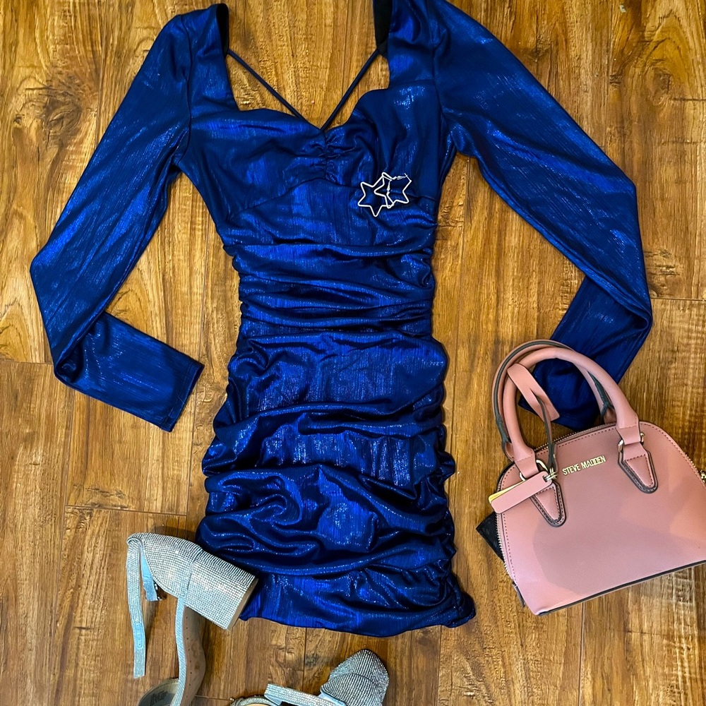 This is a very nice dress it has been worn once! In really good shape!